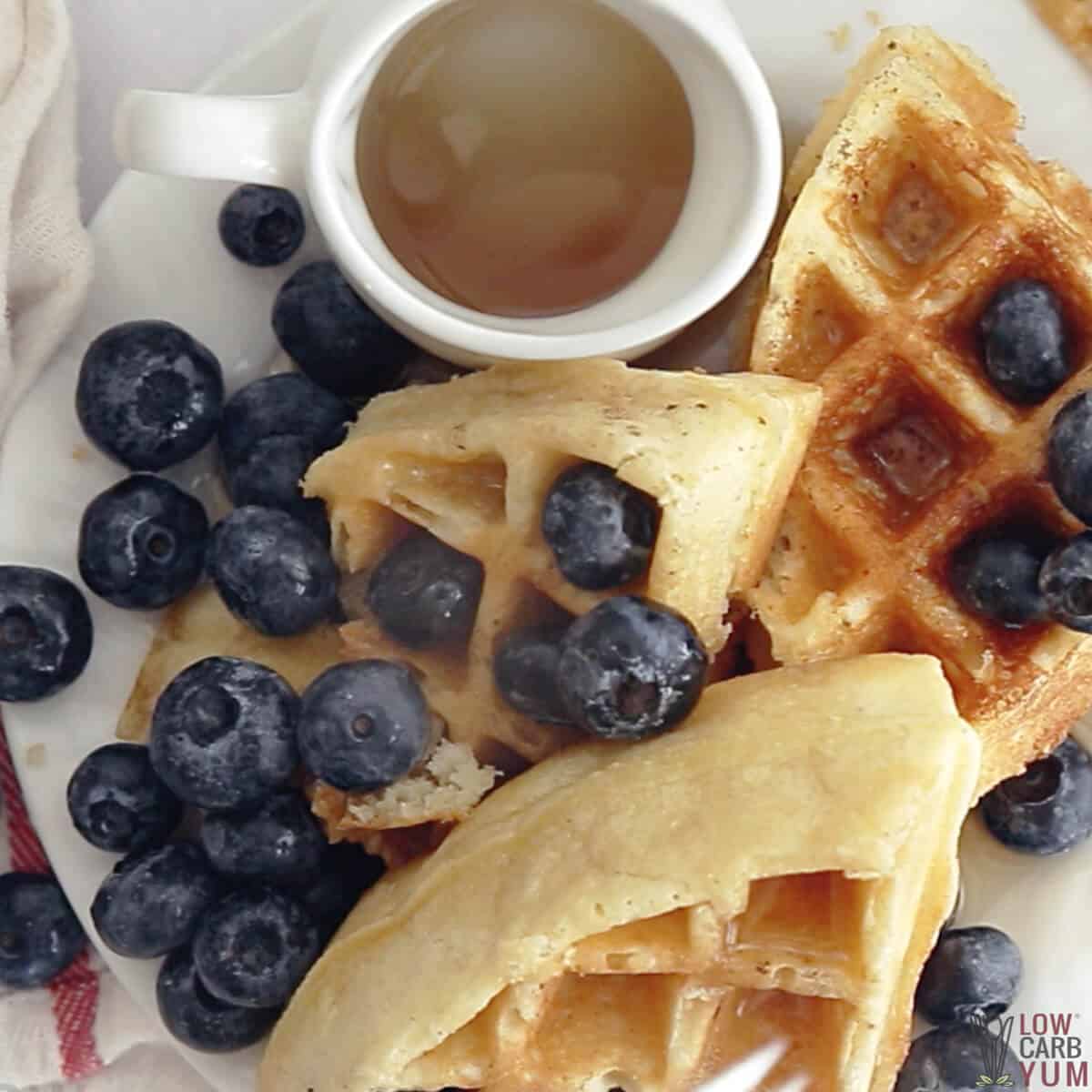 almond flour waffles with syrup and blueberries