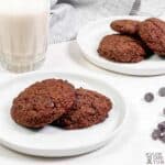 chocolate cookies on white plates.