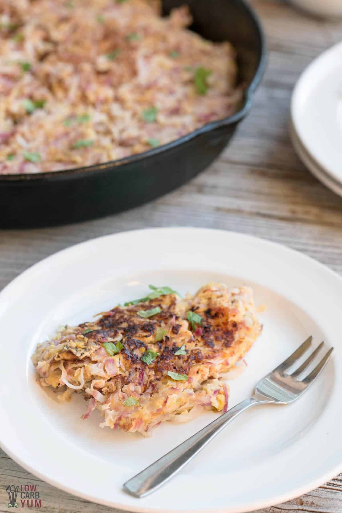 final image of keto hash browns on plate and in skillet.