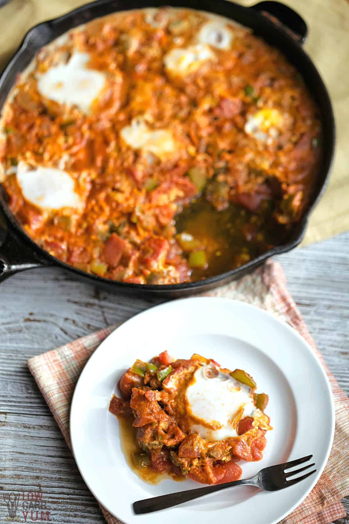 serving shakshuka on white plate