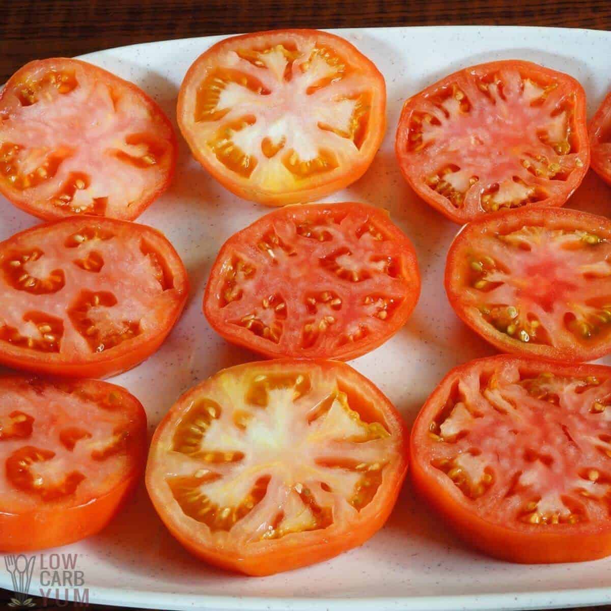 sliced tomatoes on white platter