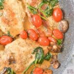 tuscan chicken dish in skillet