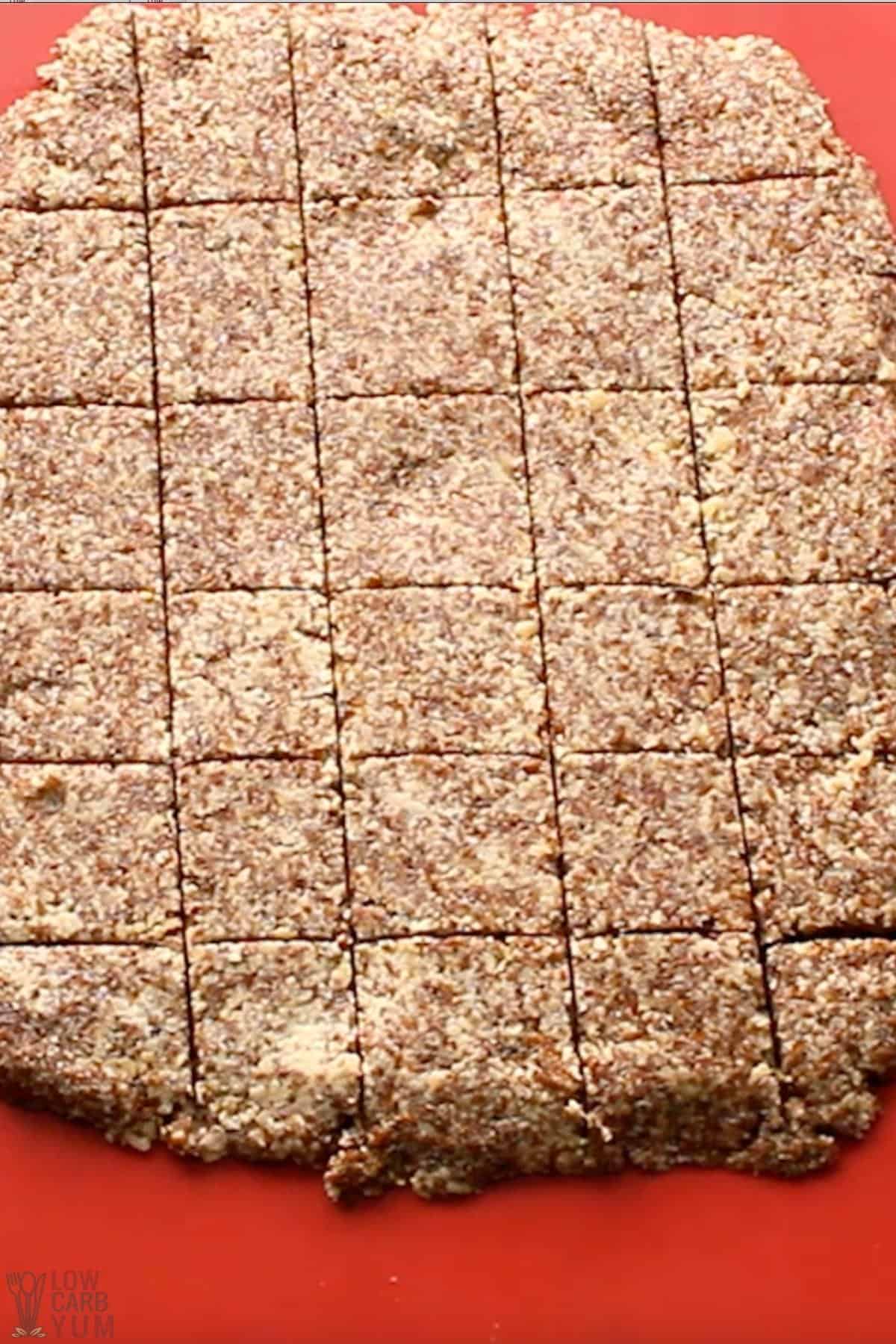 baked flax crackers on lined sheet pan.