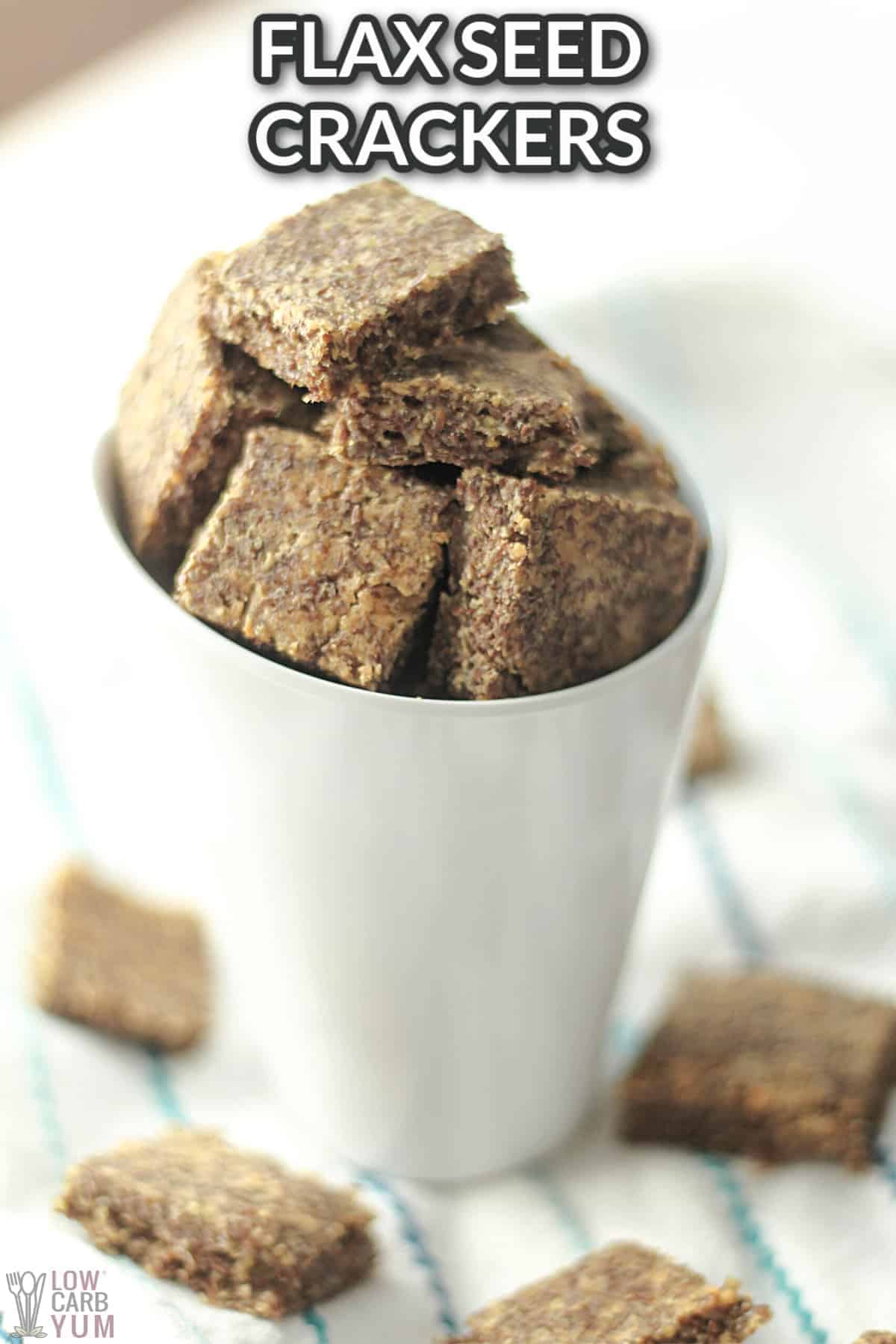 flax seed crackers in white cup.