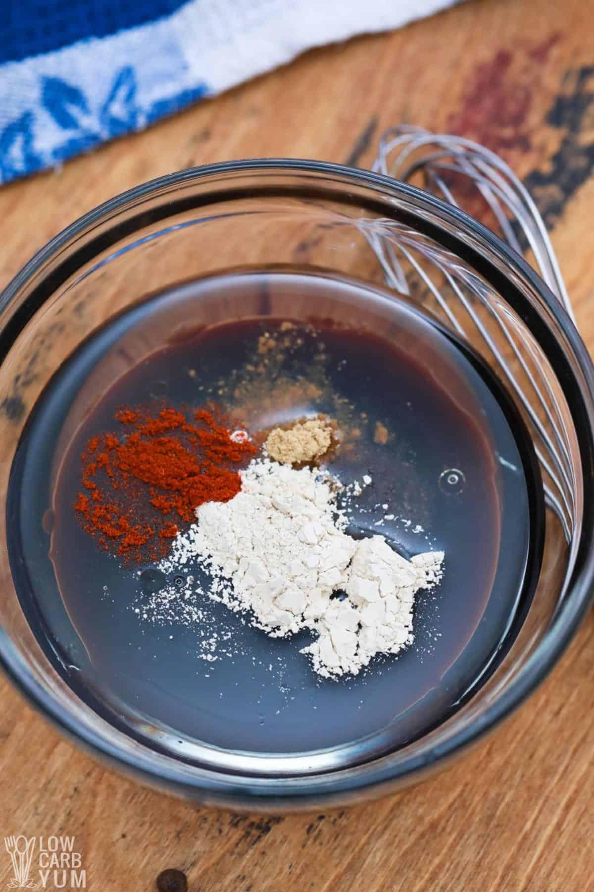 ingredients in bowl with whisk