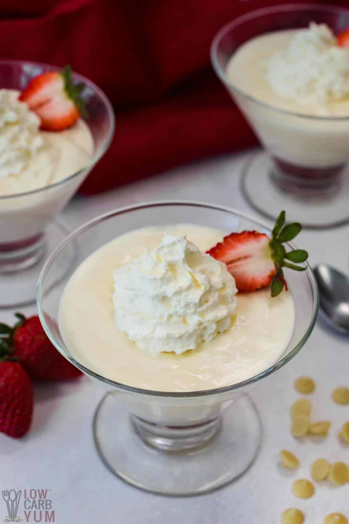 white chocolate mousse in glass dessert dishes.