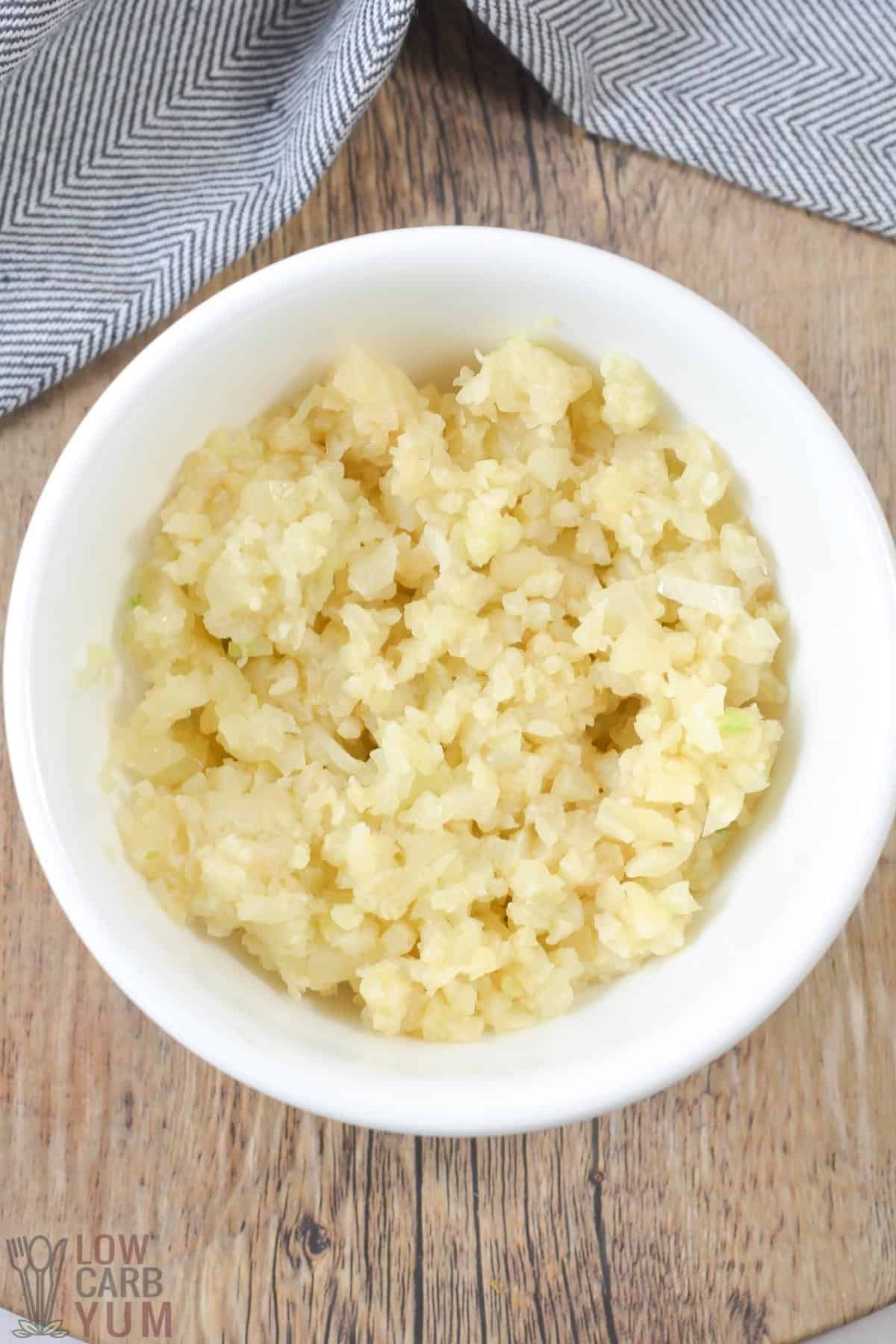 cauliflower rice in small white bowl.