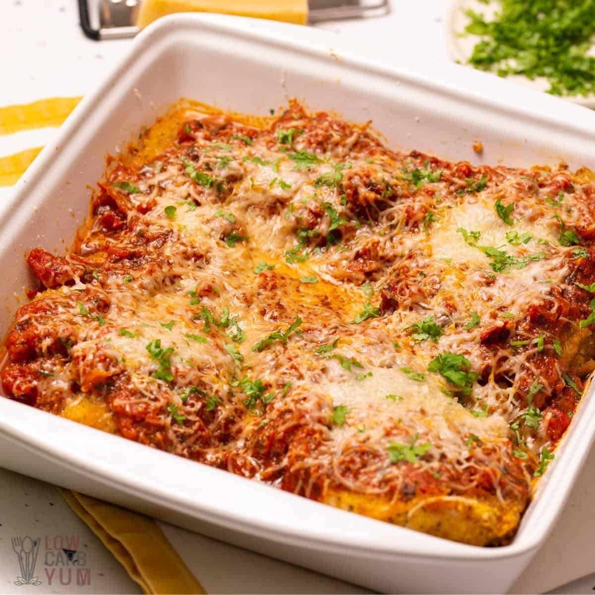 chicken parmesan in square baking dish.