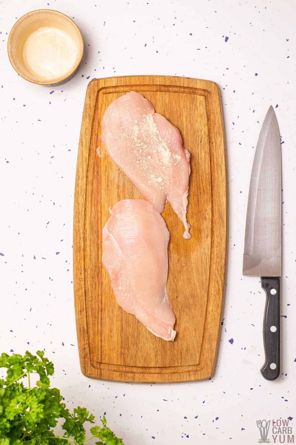 prepping the chicken breasts.