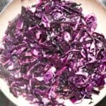 sautéed red cabbage in skillet.