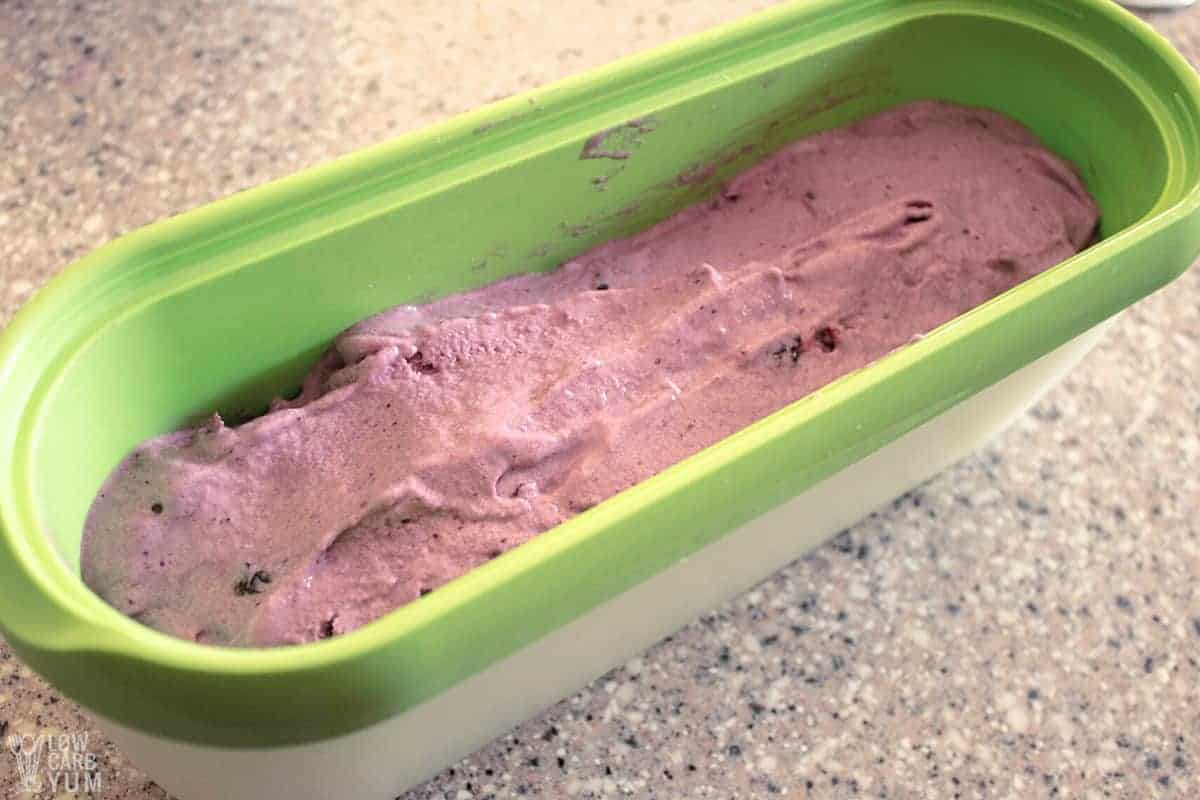 blueberry ice cream in freezer tub.
