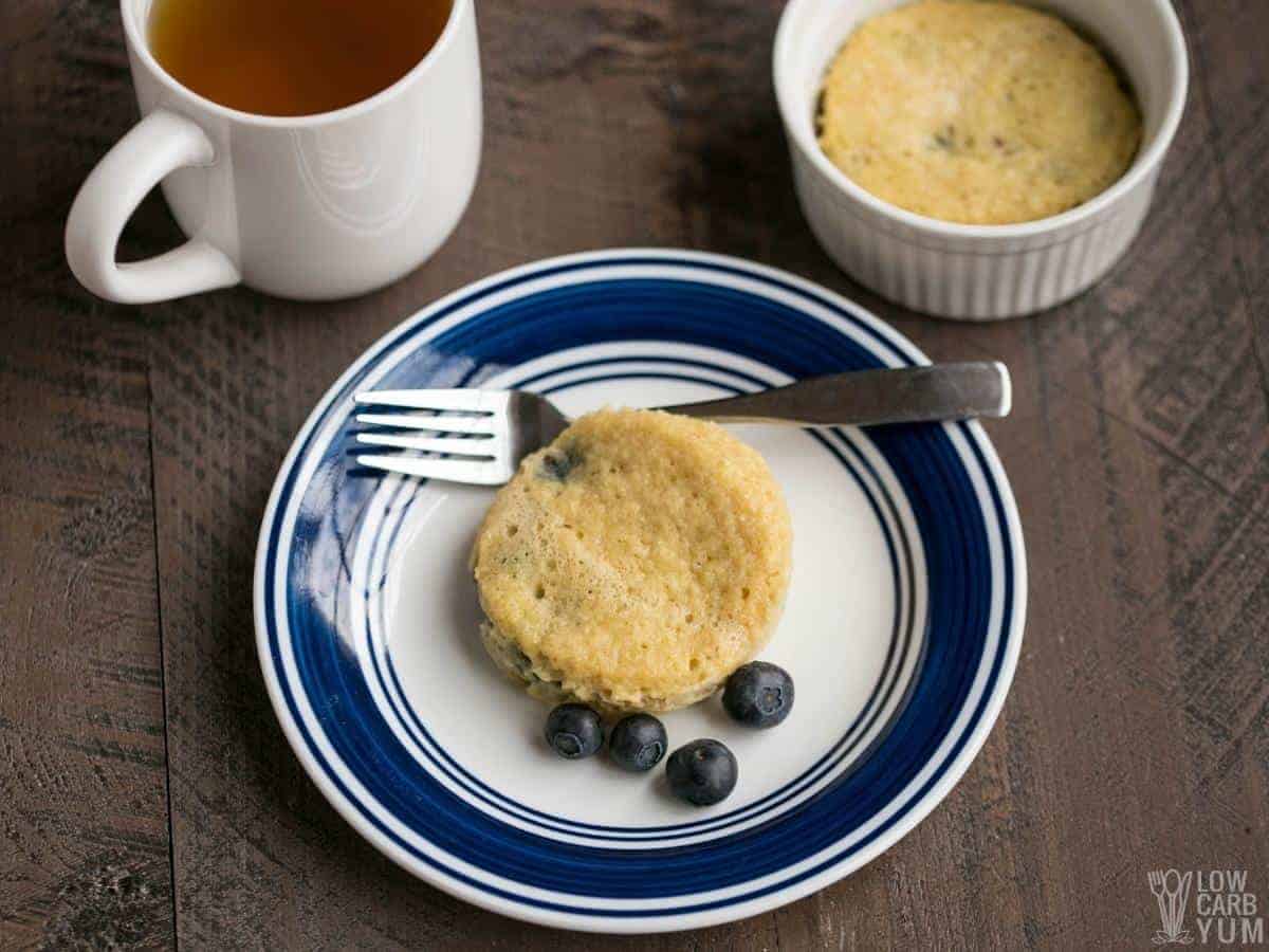 blueberry mug cake on white plate.