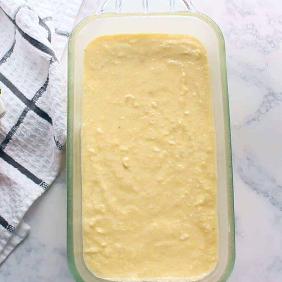 poundcake batter in loaf pan.