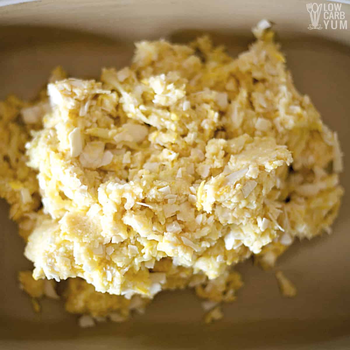 coconut cake batter in baking pan.