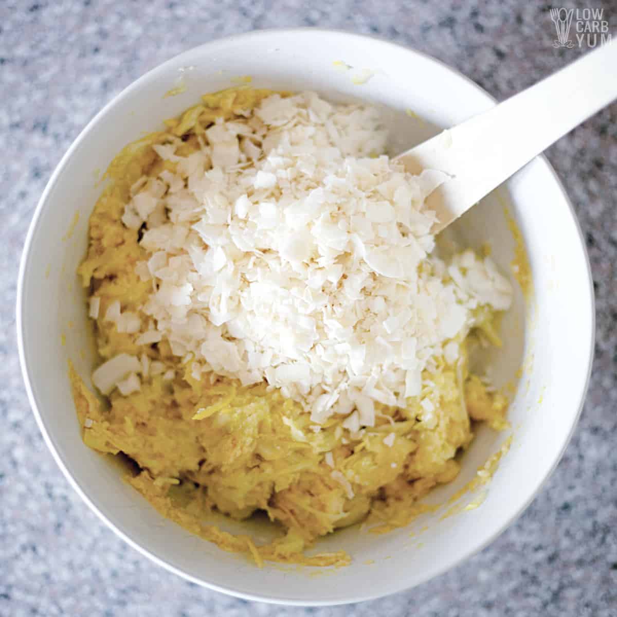 stirring in flaked coconut.