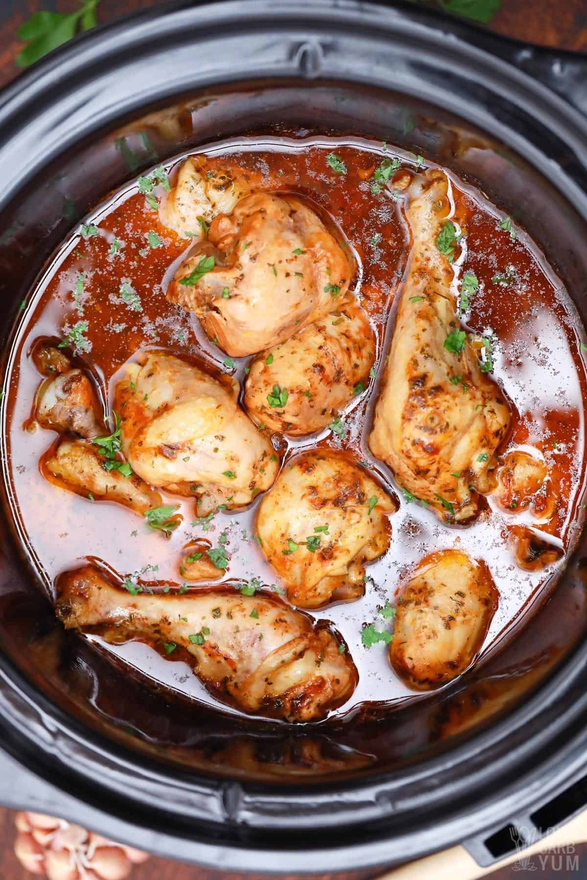 cooked buffalo chicken in crock pot.