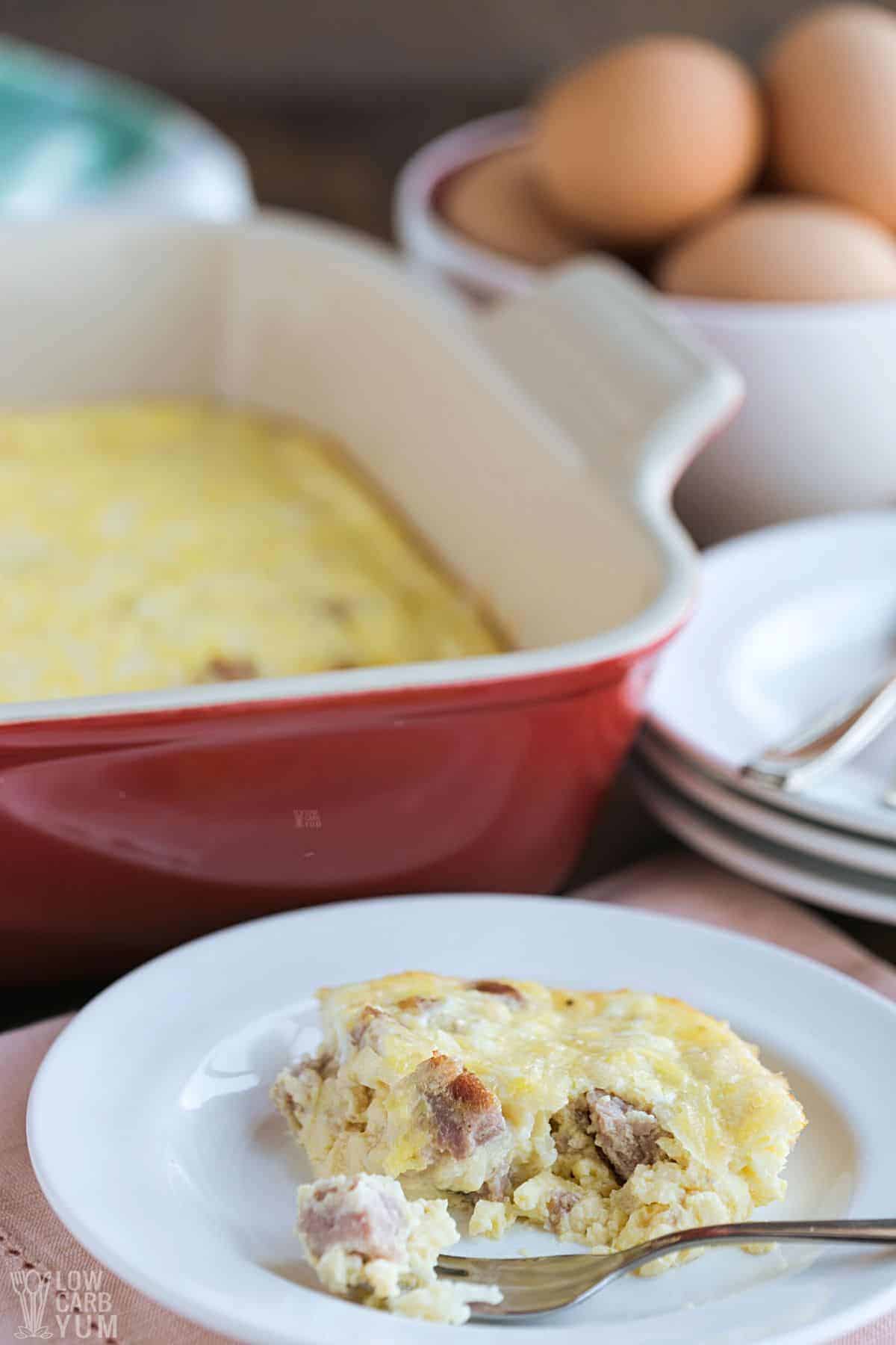 serving egg bake with ham and cheese.