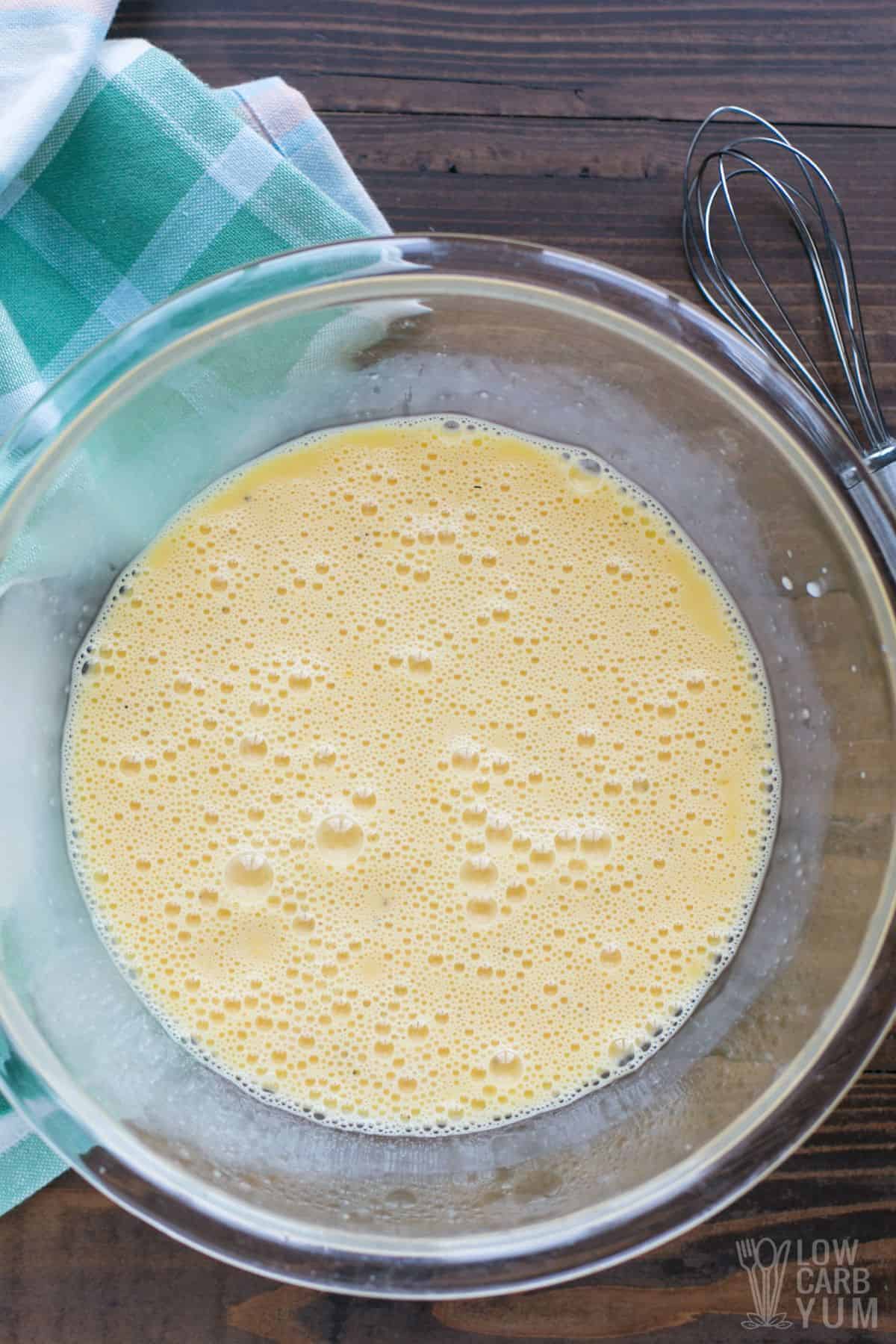 egg mixture in glass mixing bowl.