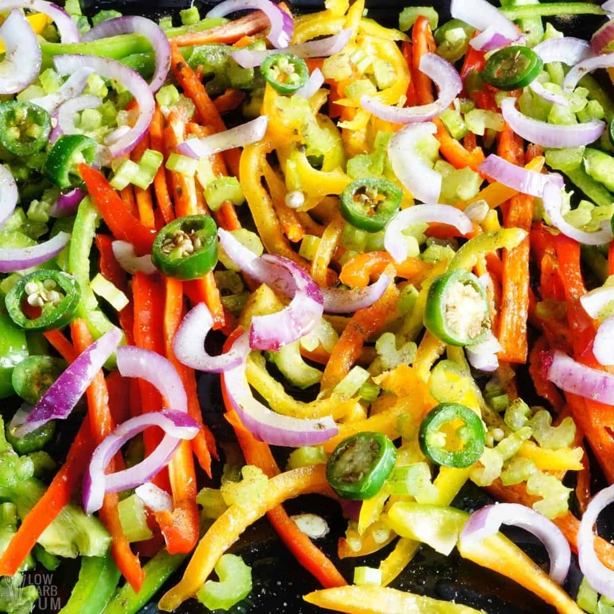 fajita vegetables on sheet pan.