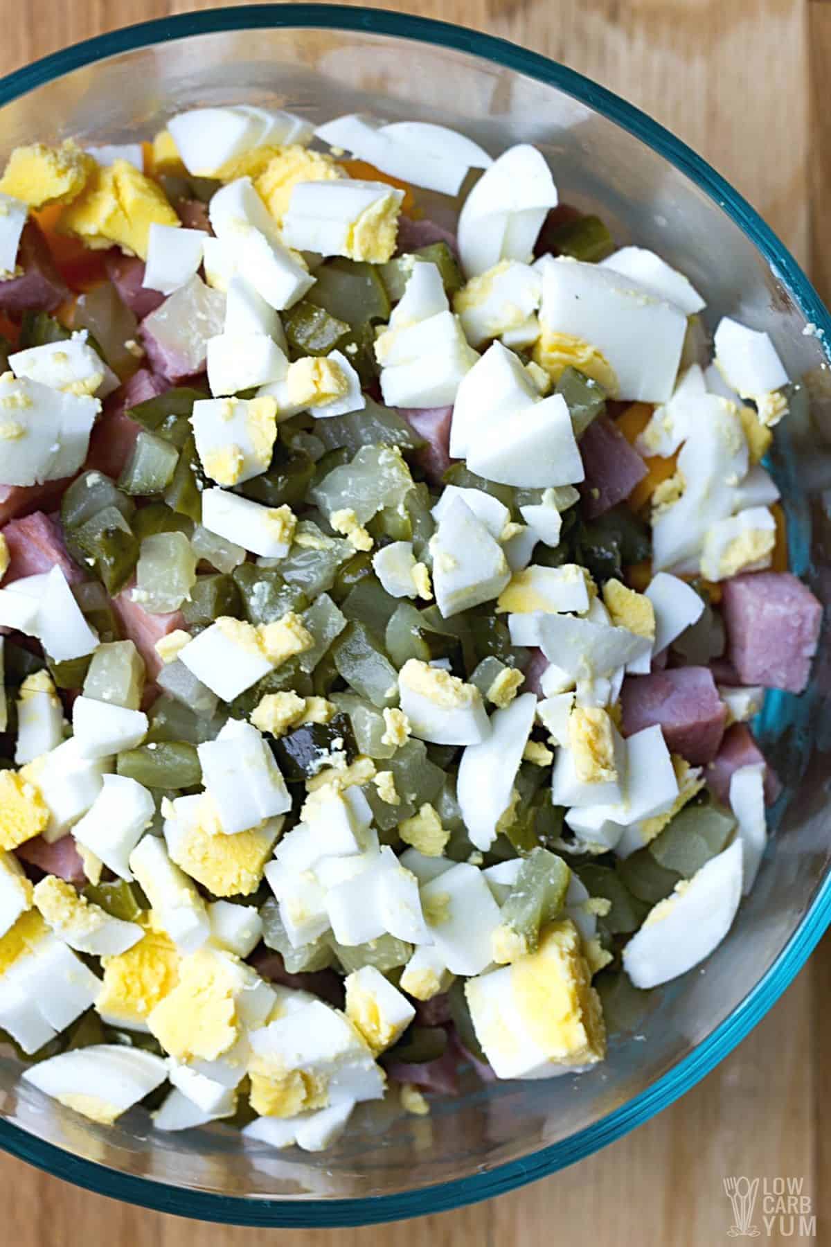 macaroni salad main ingredients in bowl.