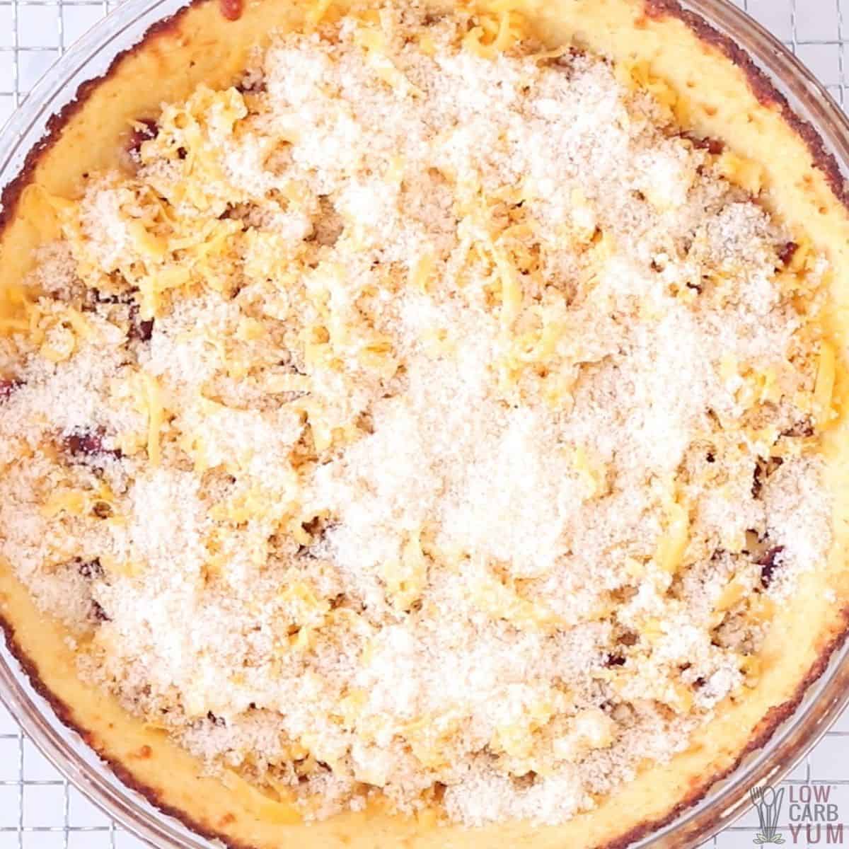bacon and cheese sprinkled into cauliflower quiche crust.