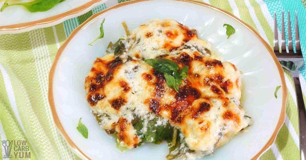 chicken florentine casserole serving on white plate.