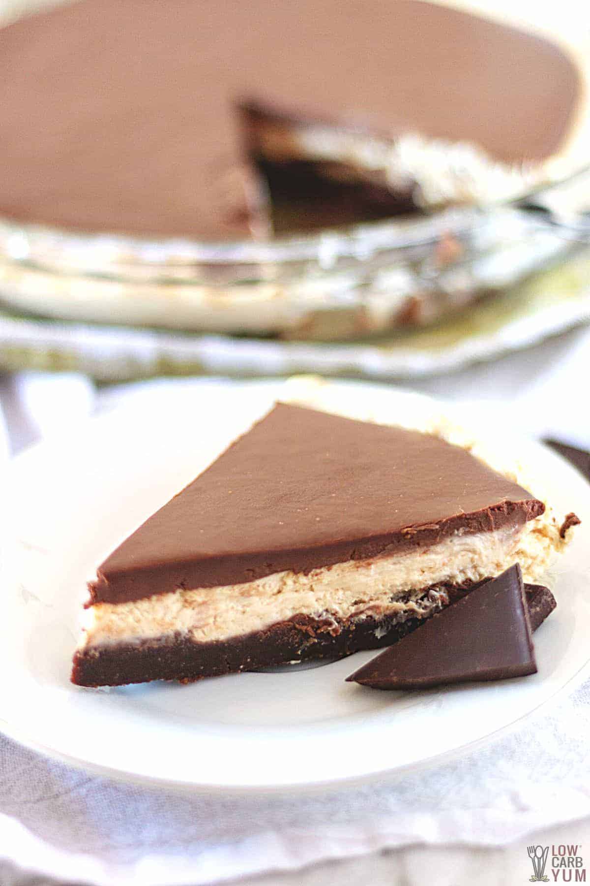 slice of chocolate peanut butter pie side view.