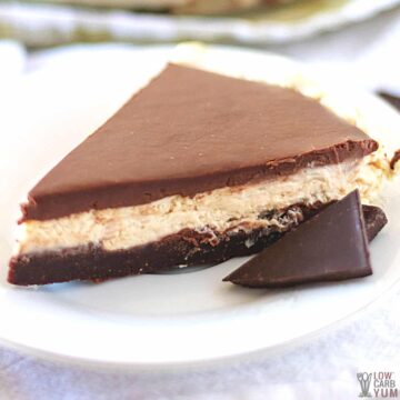slice of no bake chocolate peanut butter pie on white plate.