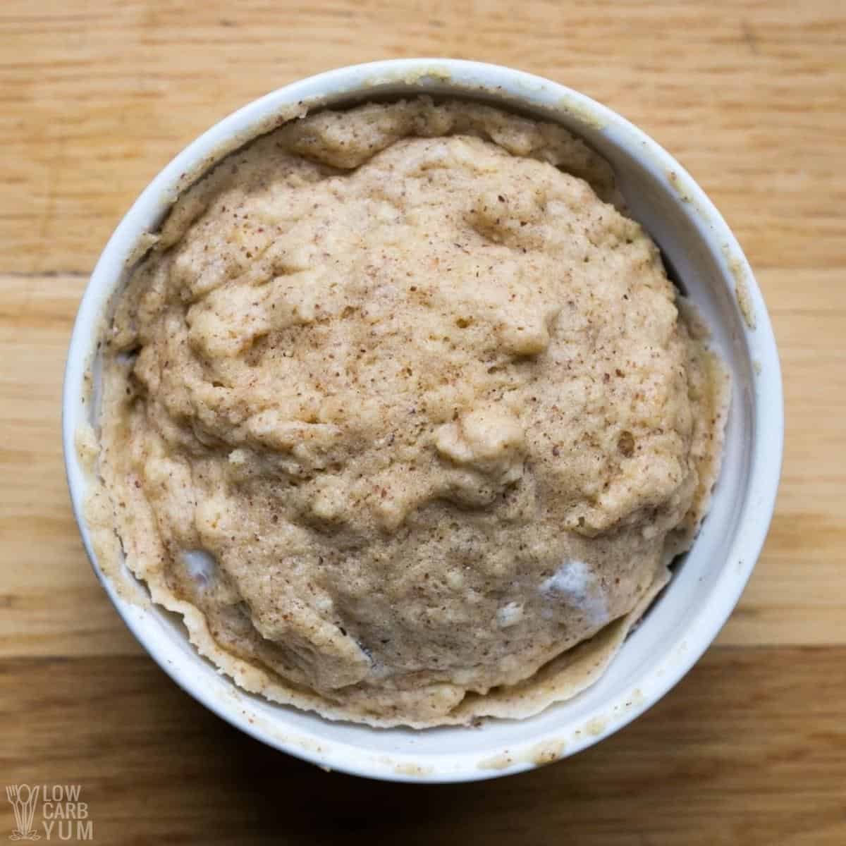 cooked english muffin in ramekin.