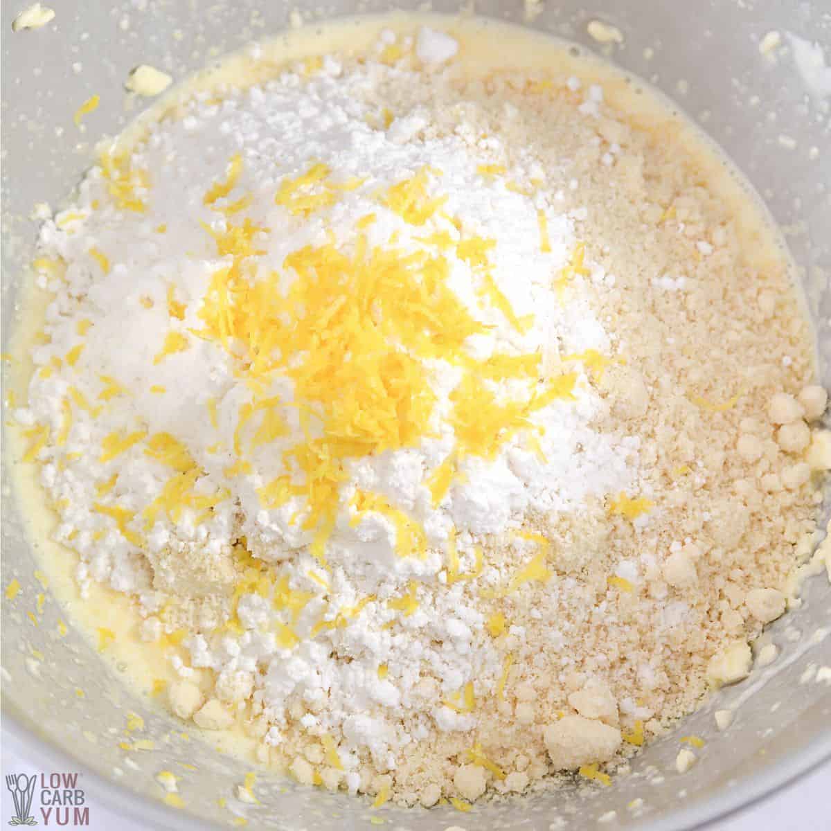 flour baking powder lemon zest in bowl.