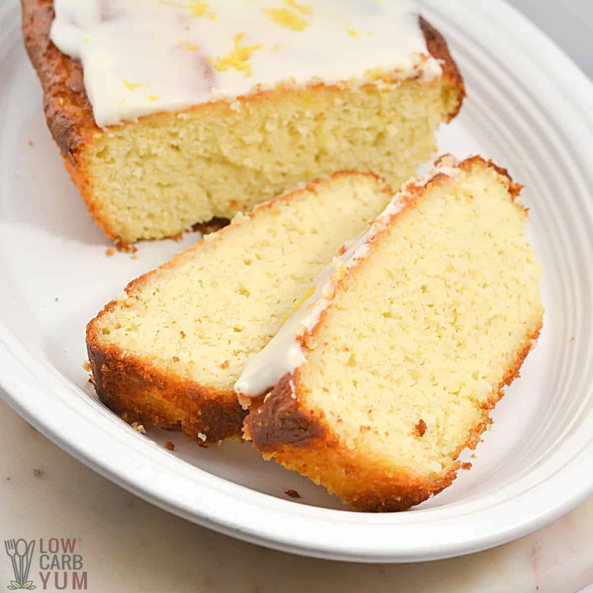 sliced lemon loaf on white platter.