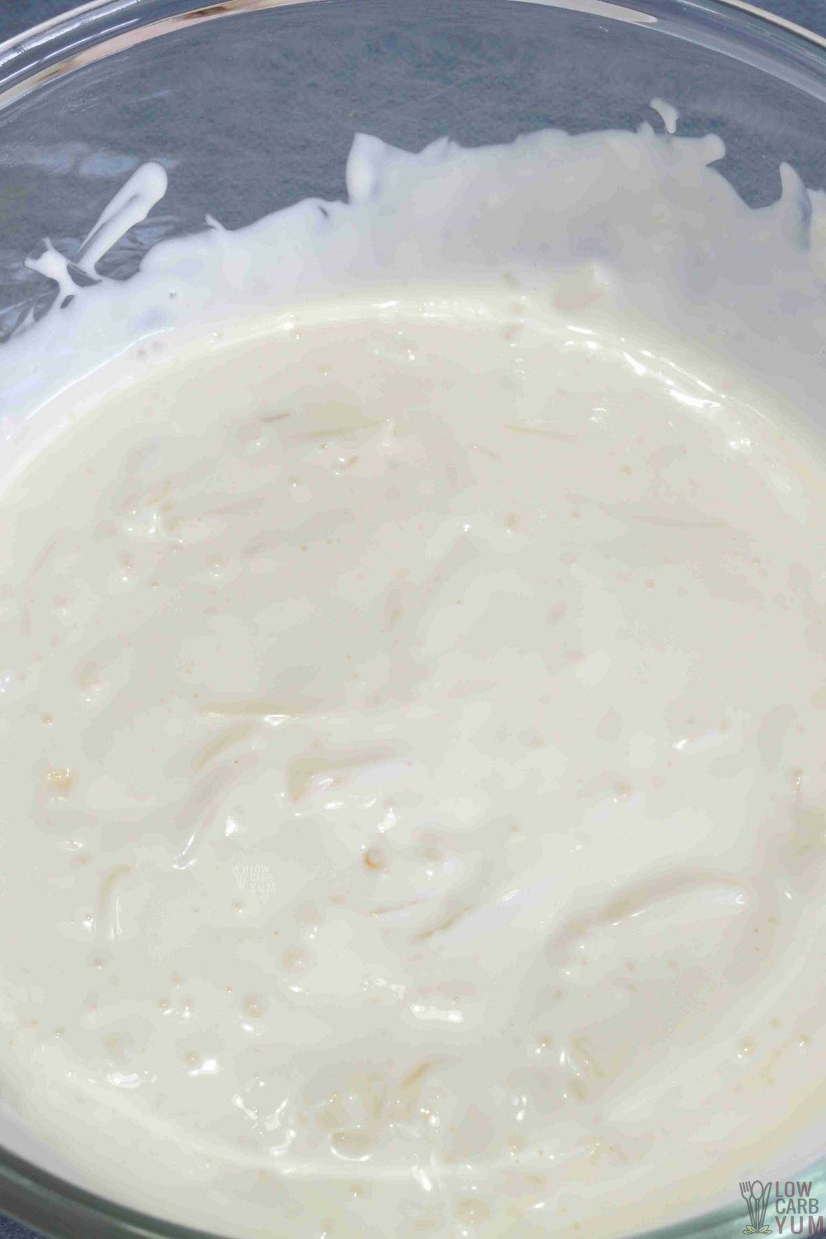 prepared sauce in glass mixing bowl.