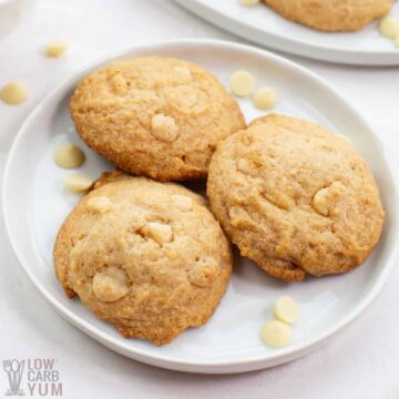 white chocolate hazelnut cookies on white rimmed plate.