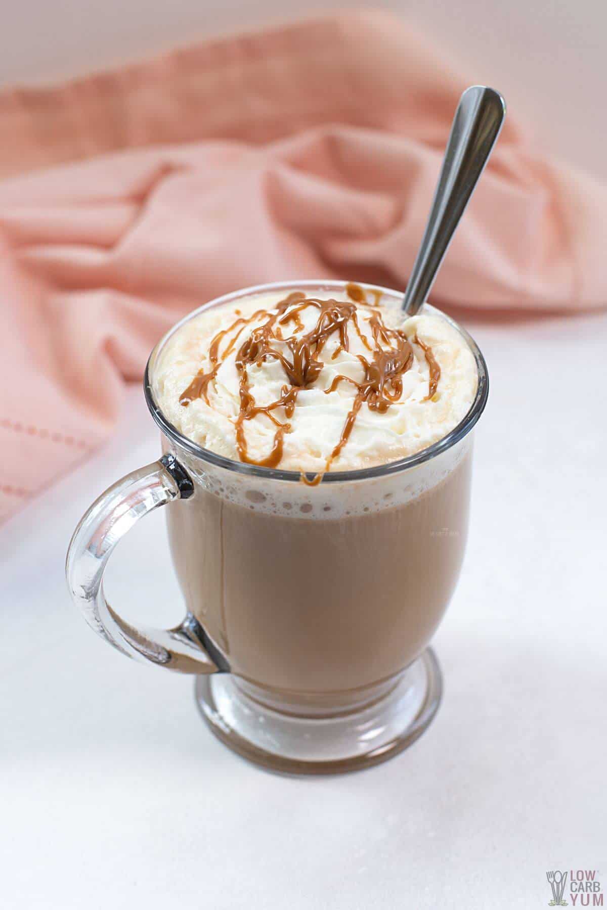 cookie butter latte with long spoon.