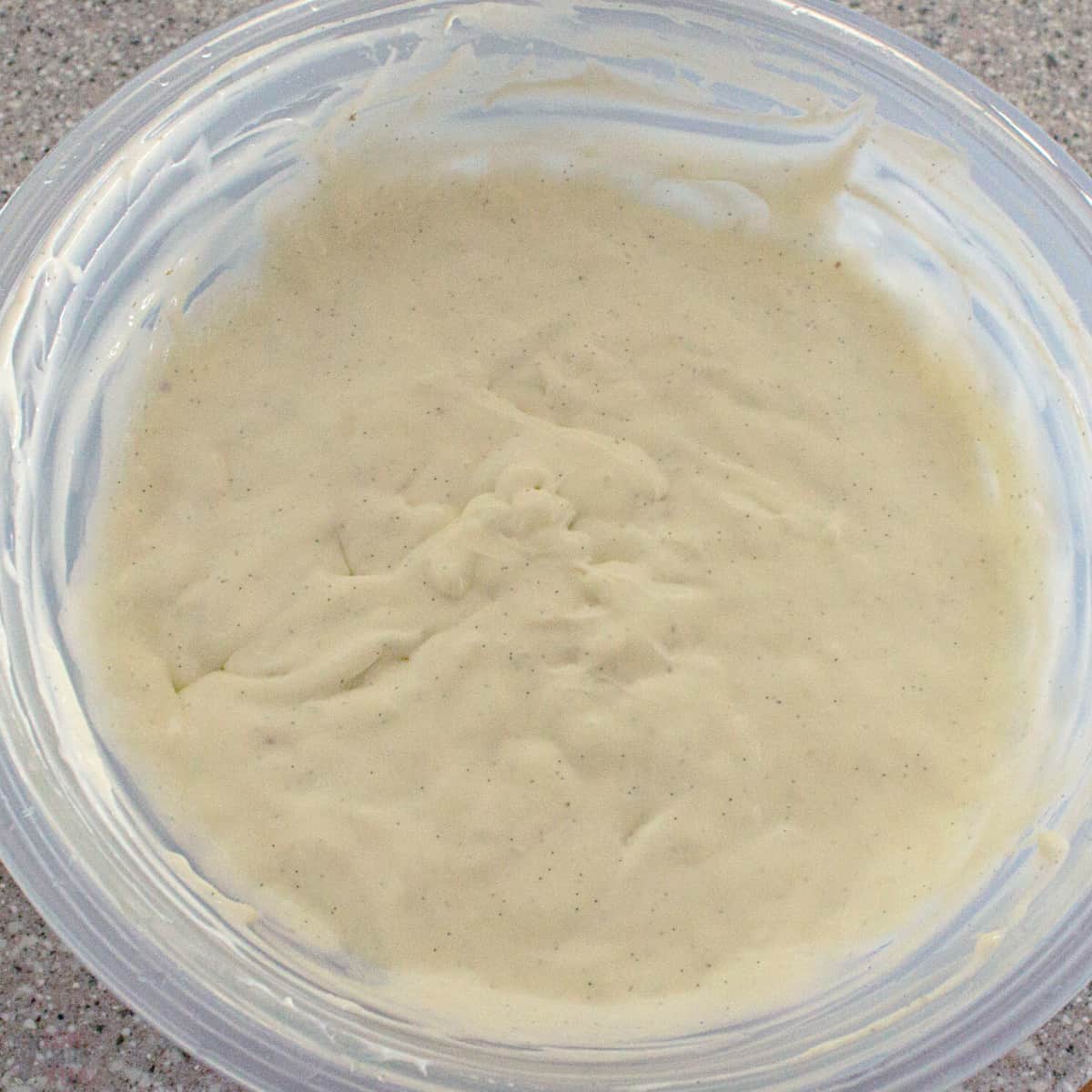 cream cheese and milk mixture in glass bowl.