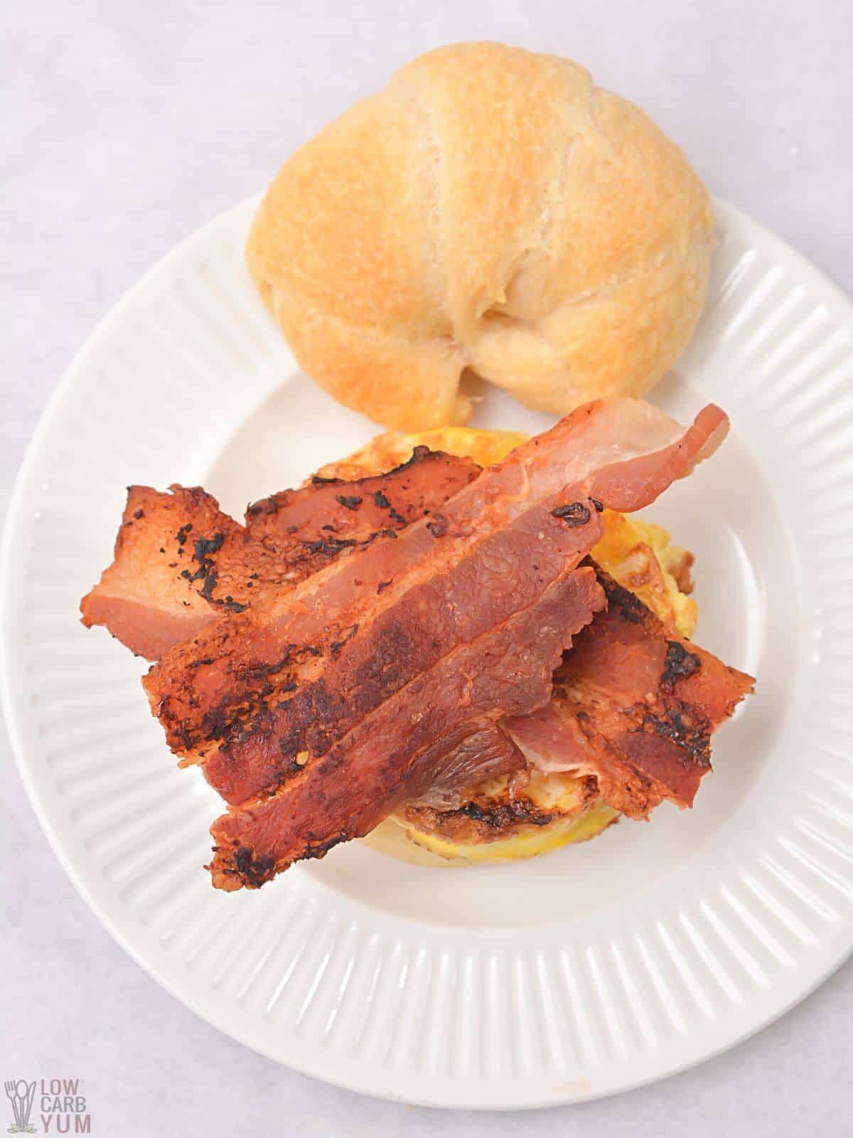 bacon added to breakfast sandwich.