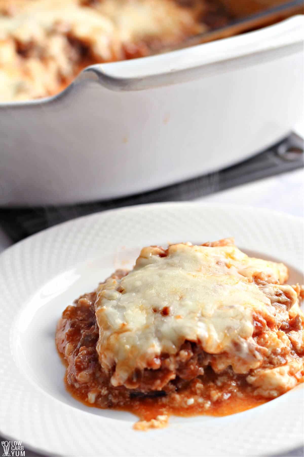 serving of eggplant lasagna on white plate.