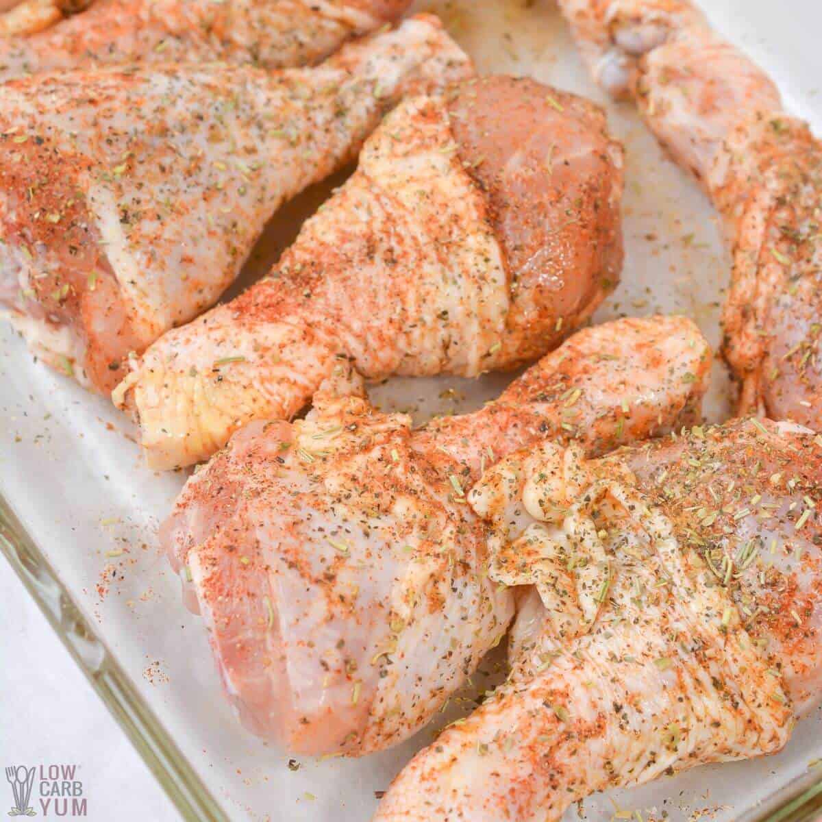 final seasonings rubbed onto chicken legs.