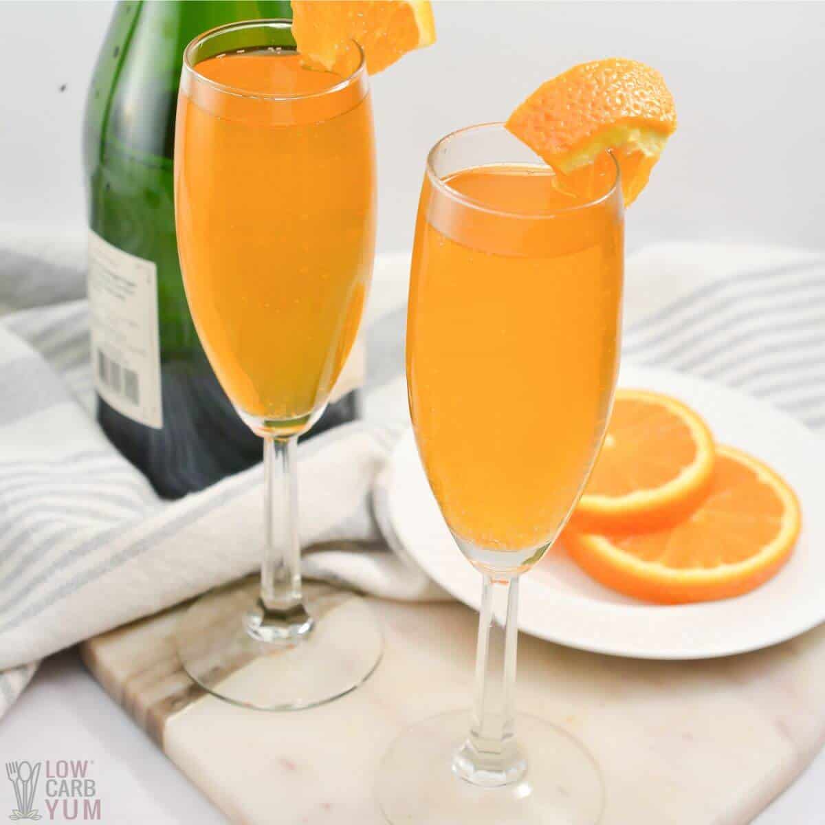 keto mimosa in champagne glasses.