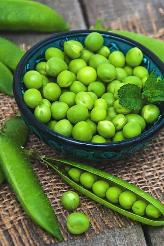 peas in black bowl.