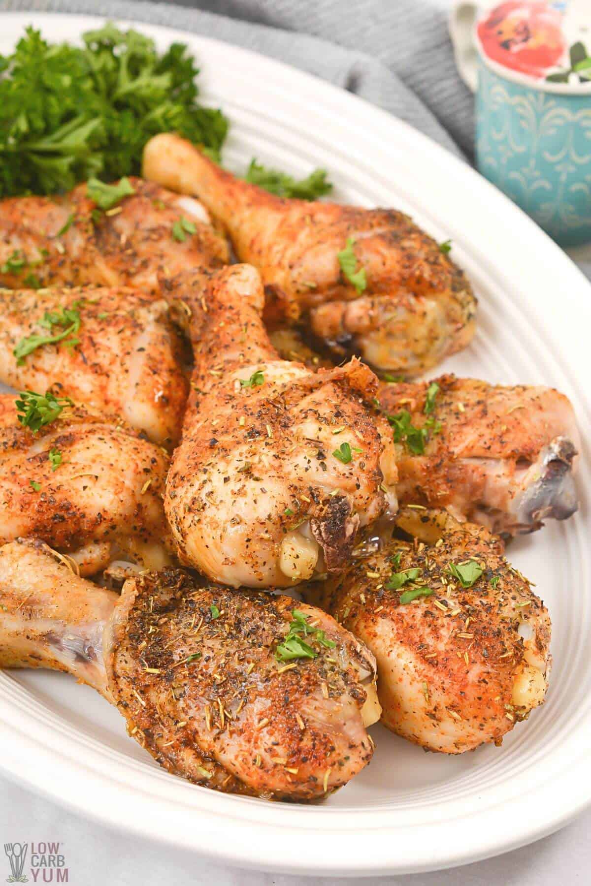 roasted chicken legs on serving platter.