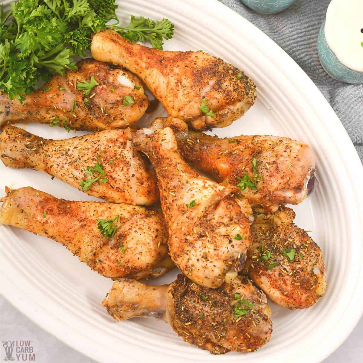 roasted chicken legs on serving platter.