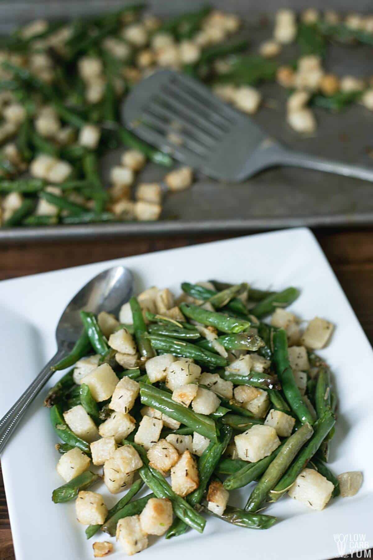 roasted jicama are paired with green beans for sweet potatos keto alternative