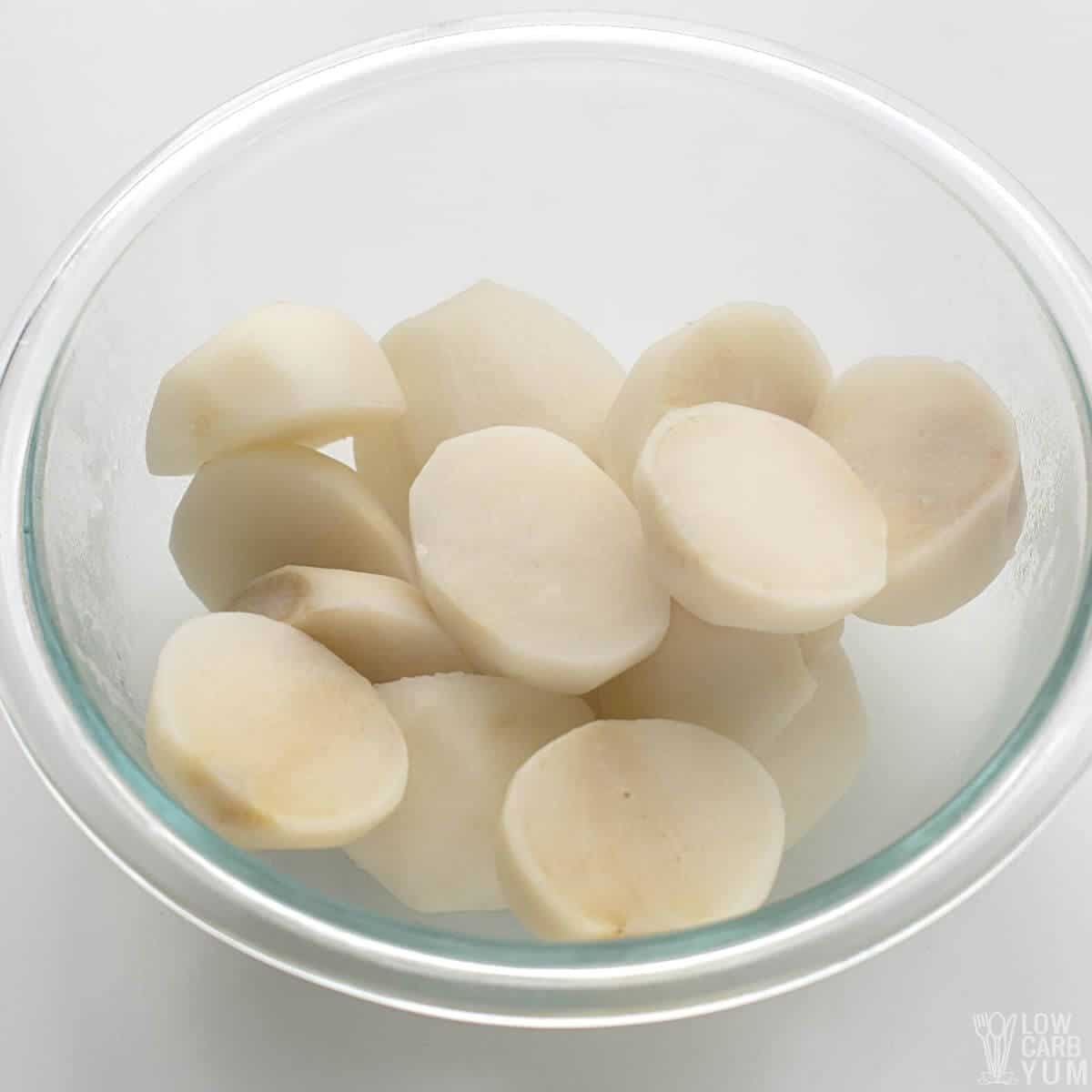 boiled turnips in glass bowl.