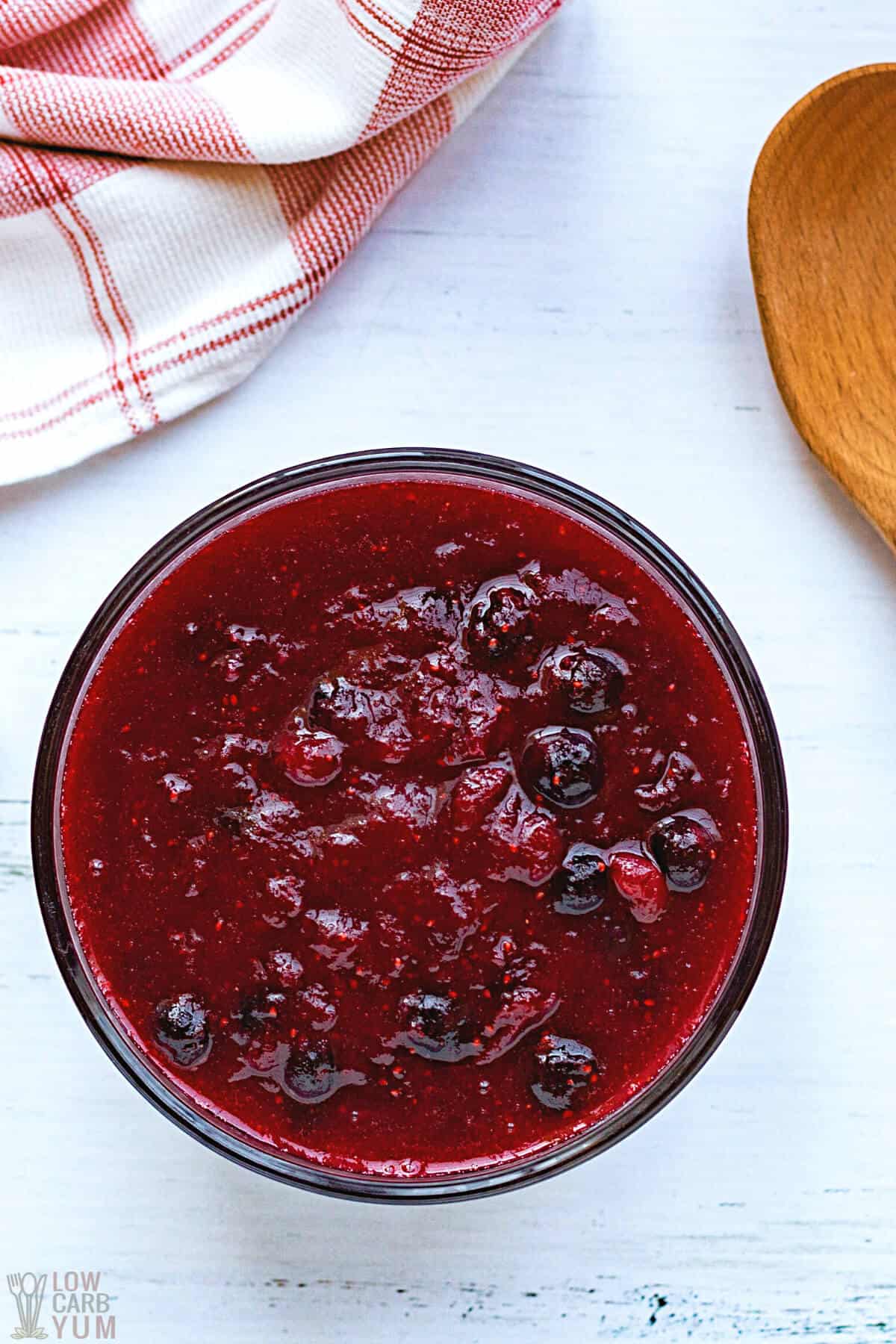 cranberry blueberry sauce in glass container.