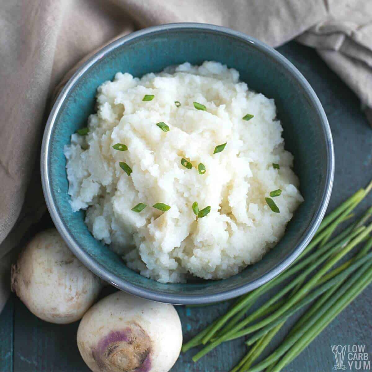 overhead of mashed turnips in bowl.