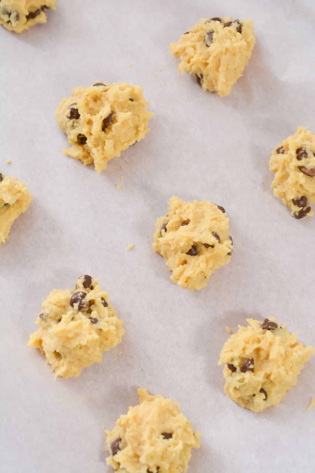 raw cookie dough on baking sheet