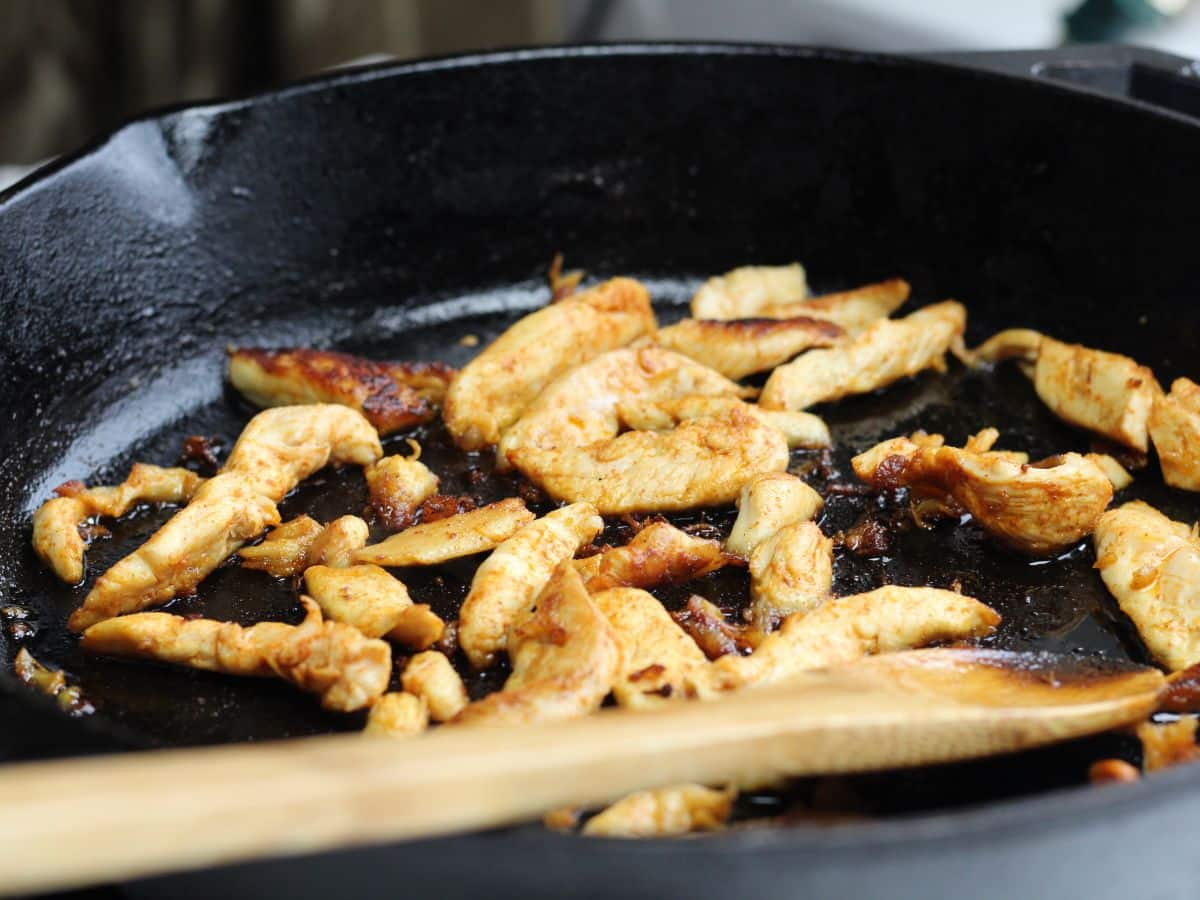 cooking chicken slices in cast iron