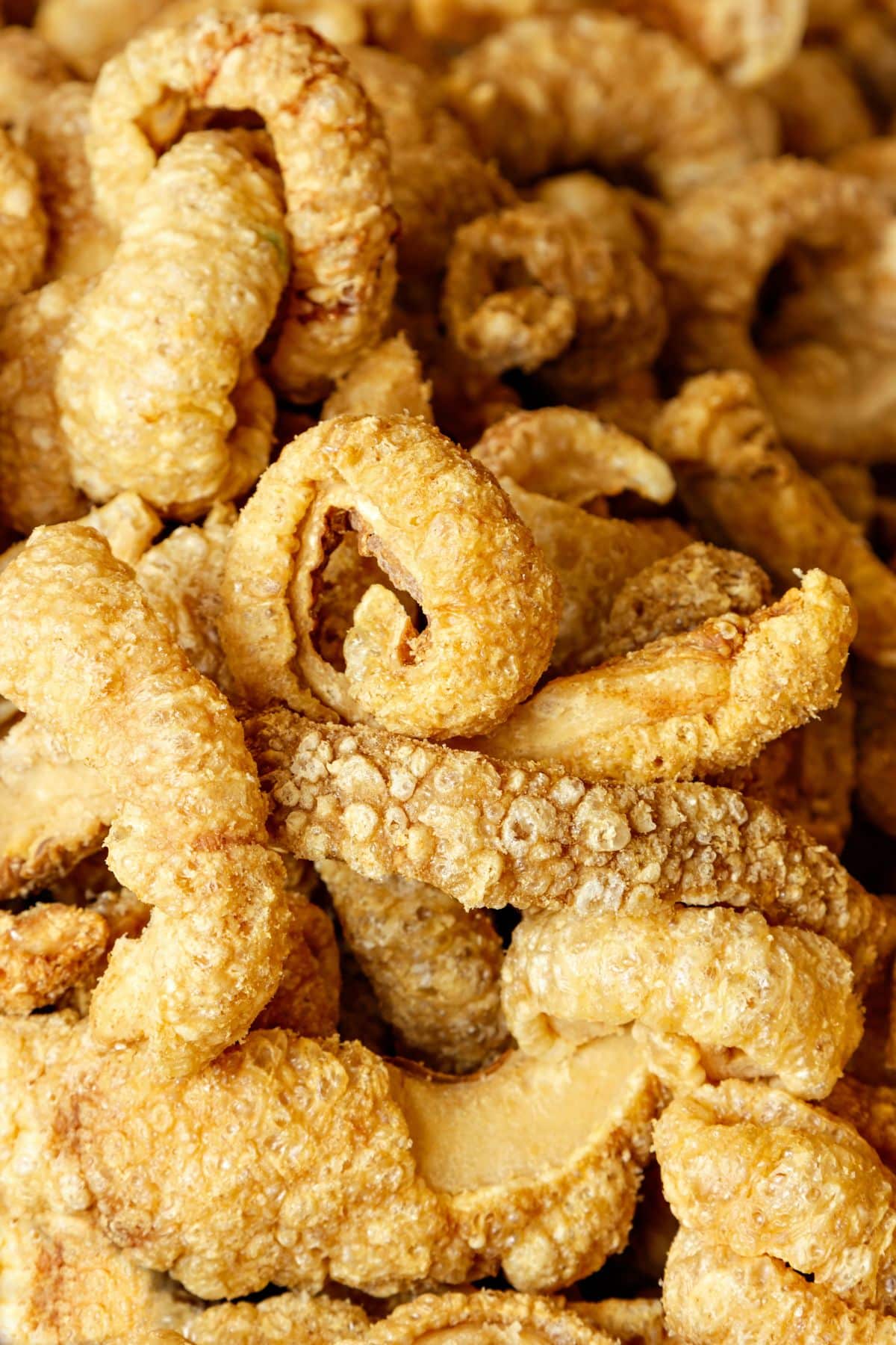 a pile of crispy keto pork rinds