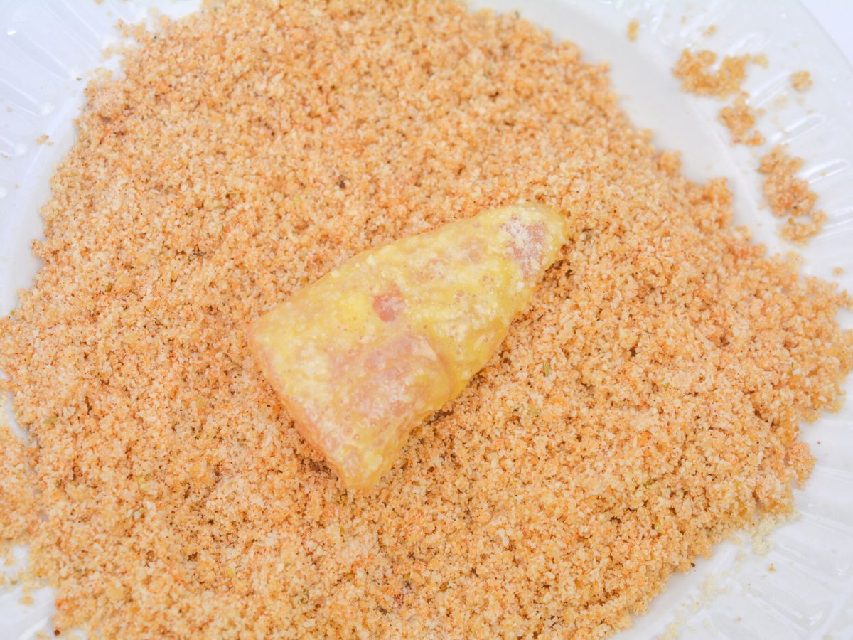 coating chicken with pork rind crumbs